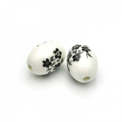 Porcelánová korálka ovál, 14 mm, čierne kvety